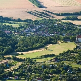 Kostel sv. Martina, v popředí Kopaniny, v pozadí Nemojany